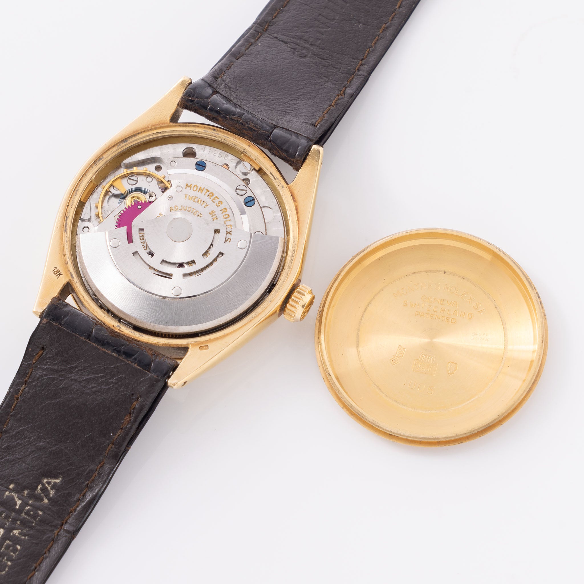 Rolex Oyster -Perpetual silver "25 years Coca Cola service " logo dial in 18 k yellow gold with original double punched papers ref 1003