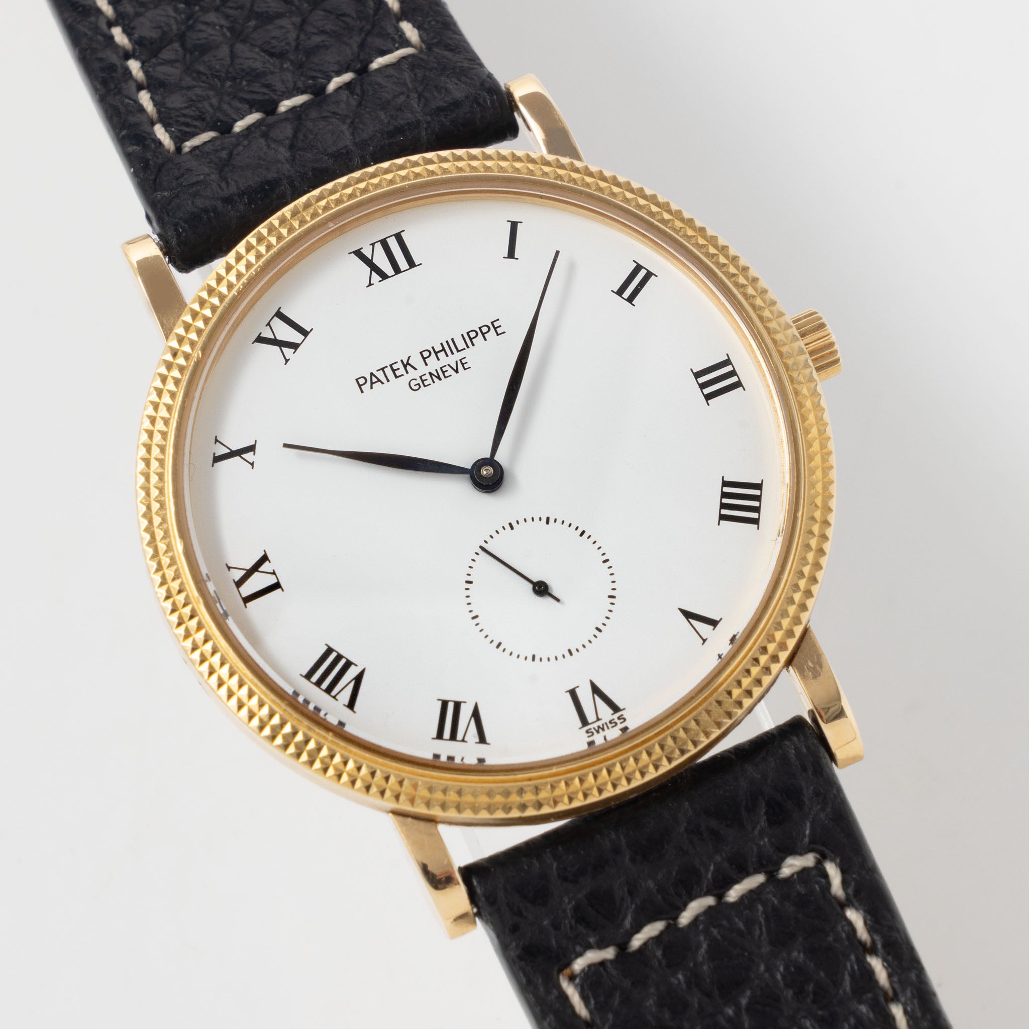 Patek Calatrava Porcelain dial , Clous de Paris 18k yellow gold case with extract from the archives ref 3919