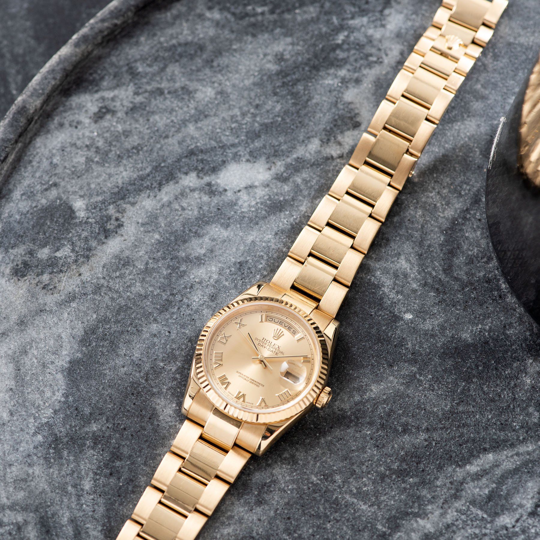 Rolex Day-Date Champagne Roman Dial 118238 with Yellow gold Oyster bracelet
