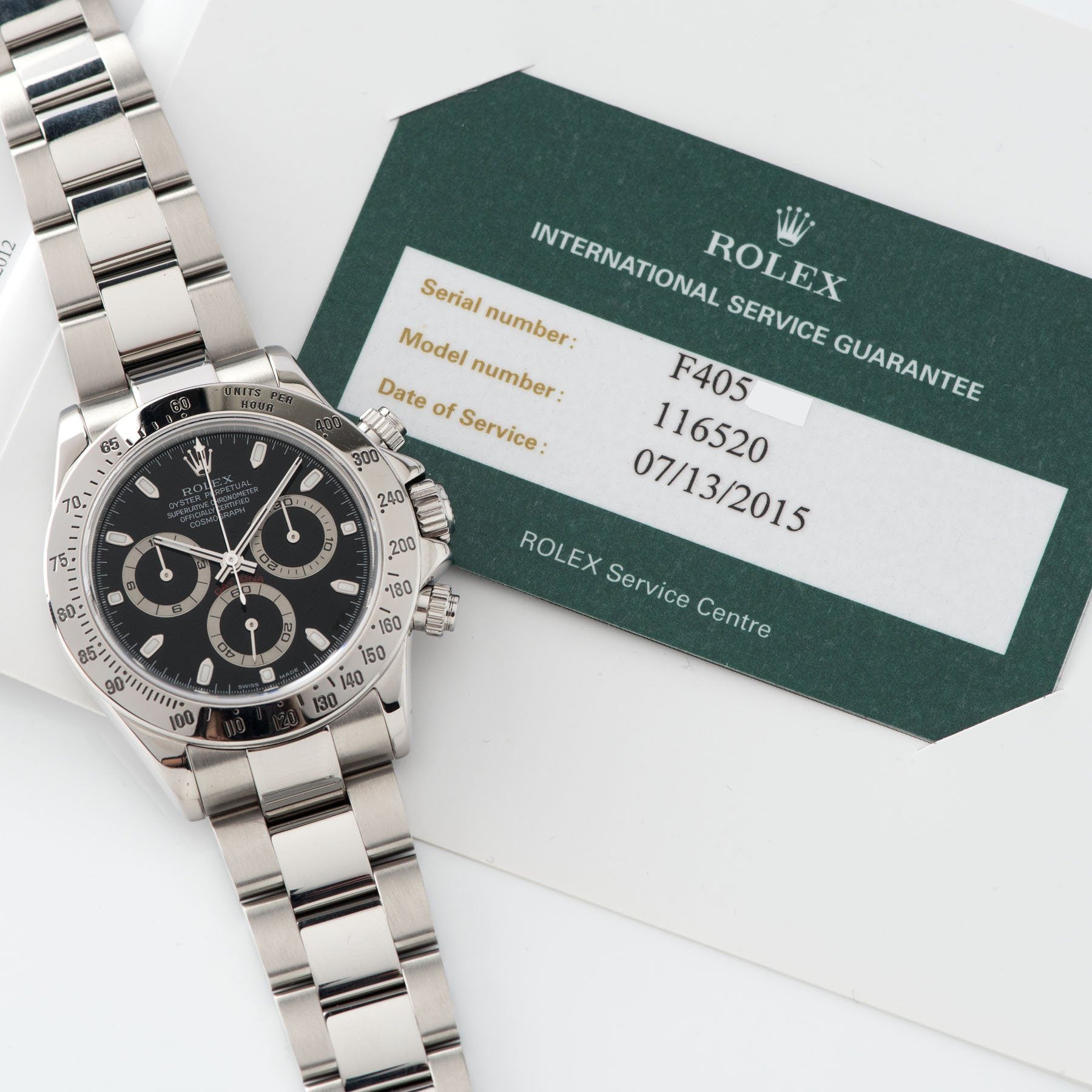 Rolex Daytona Steel 116520 Black Dial Box and Papers set with Rolex service papers