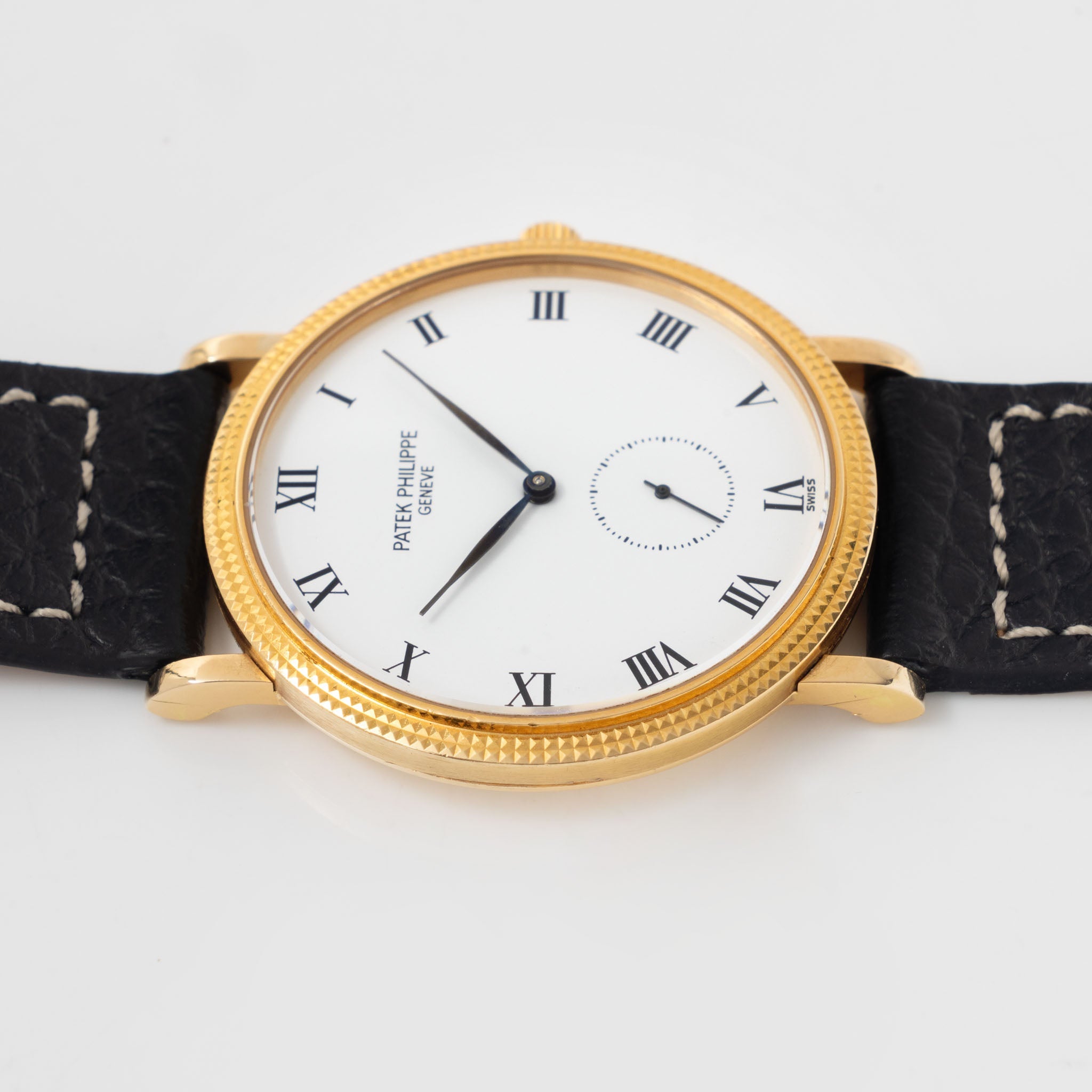 Patek Calatrava Porcelain dial , Clous de Paris 18k yellow gold case with extract from the  archives ref 3919