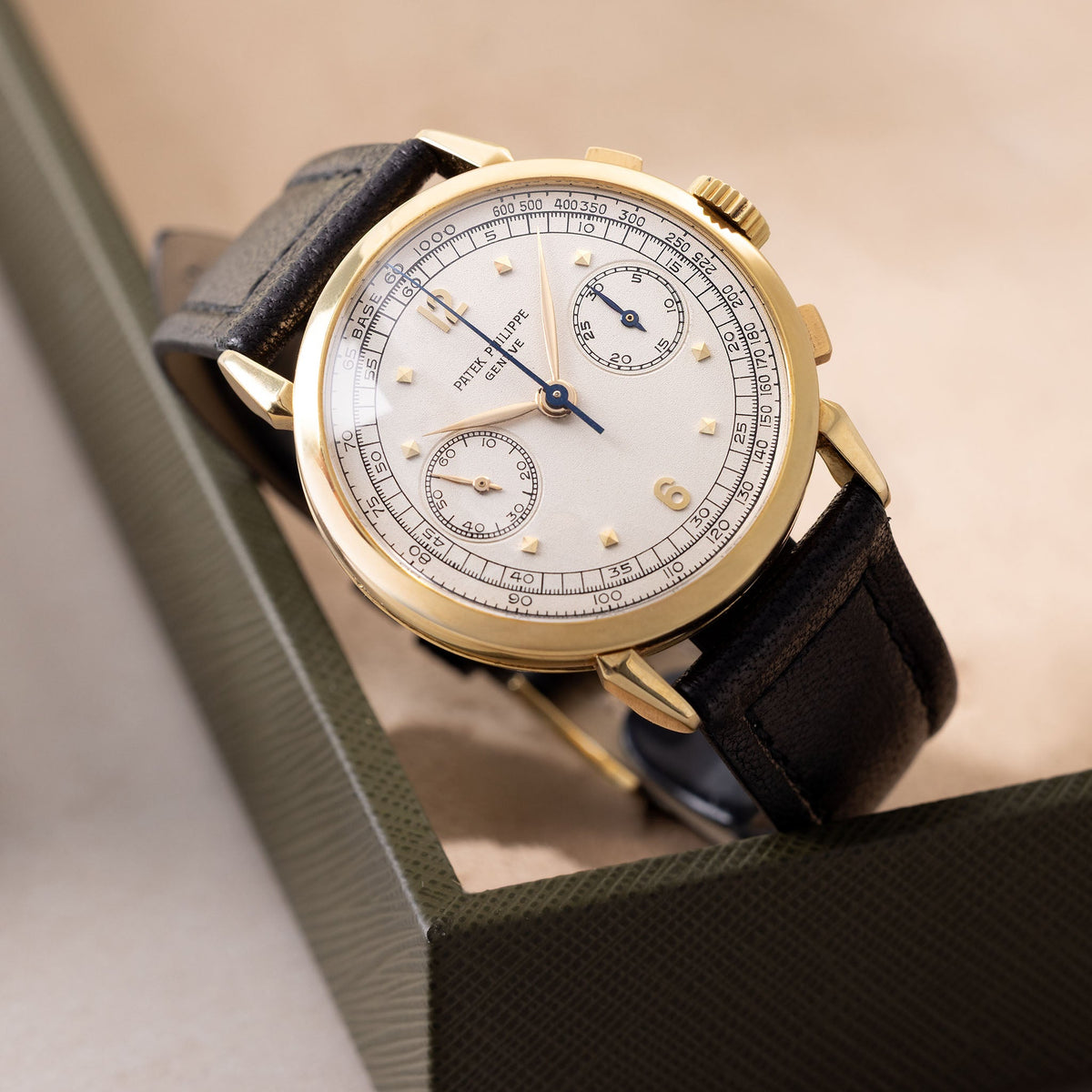 Patek Philippe Chronograph 1579J Second Series Silvered Dial in 18k Yellow Gold with Extract of the Archives