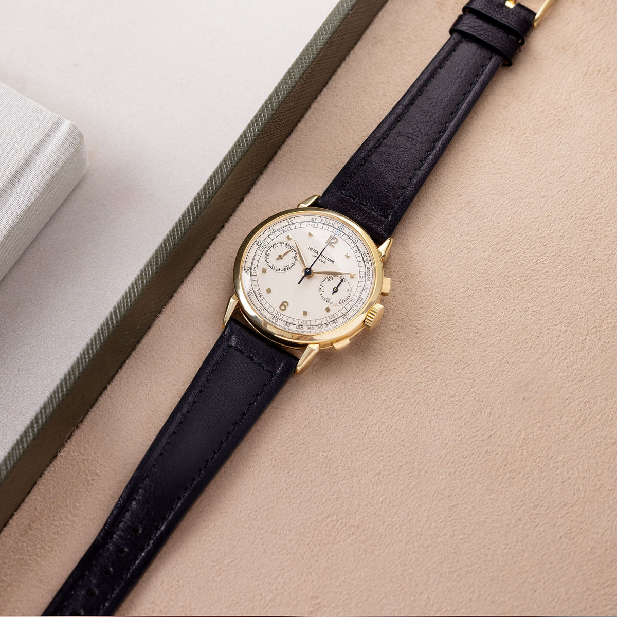 Patek Philippe Chronograph 1579J Second Series Silvered Dial in 18k Yellow Gold with Extract of the Archives