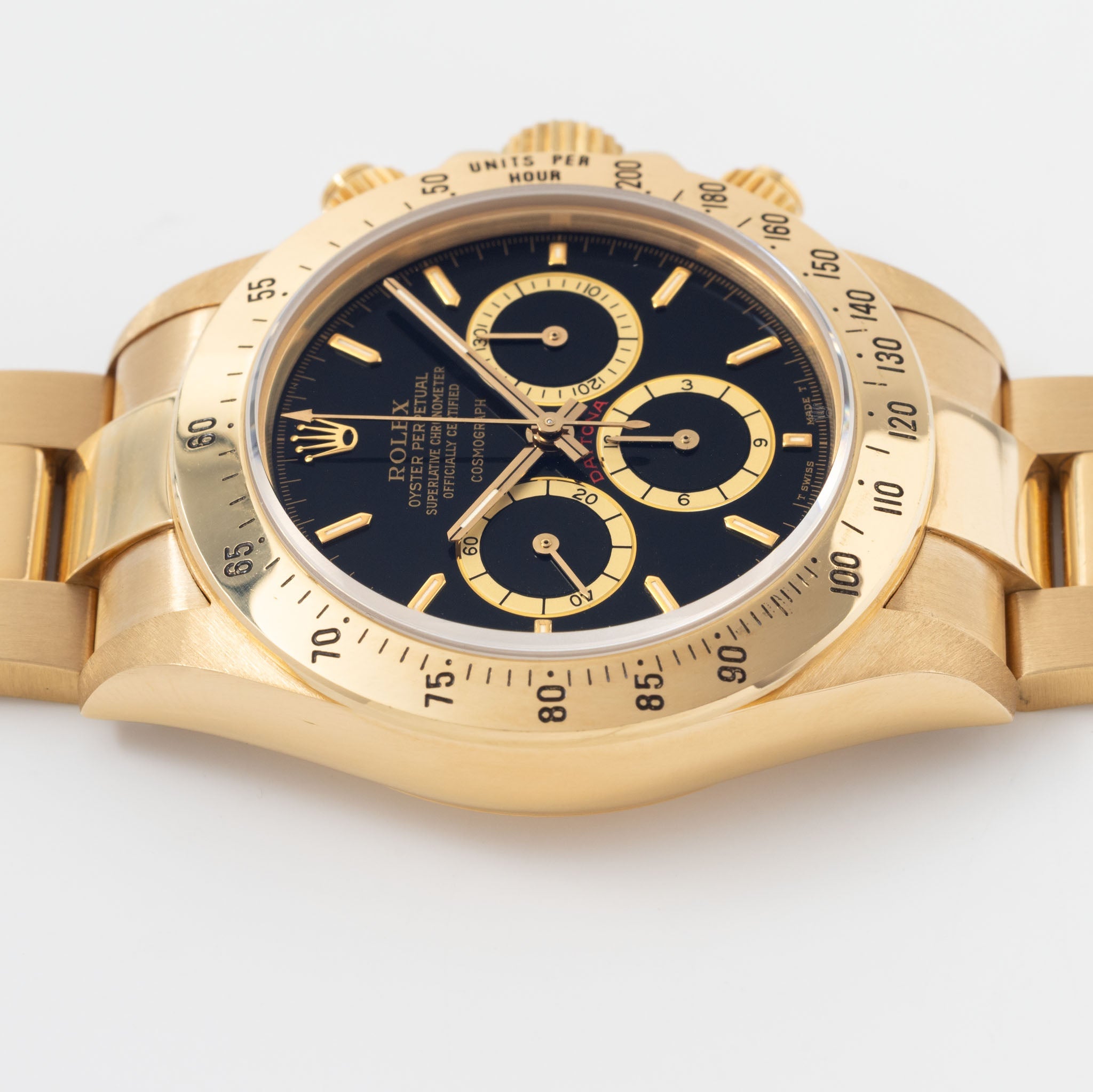 Rolex Cosmograph Daytona 16520 Black Floating Dial in 18k Yellow Gold with Original Guarantee Paper and Accessories
