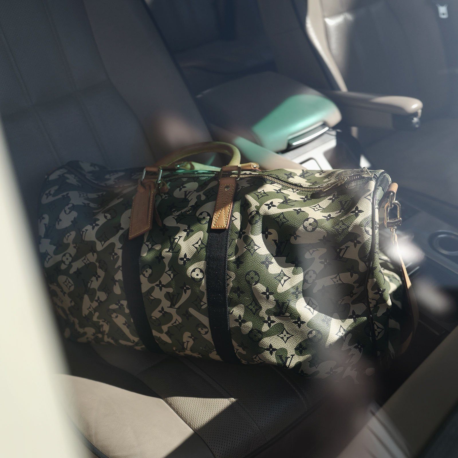 Louis Vuitton Murakami Monogramouflage Keepall 55Louis Vuitton Murakami Monogramouflage Keepall 55