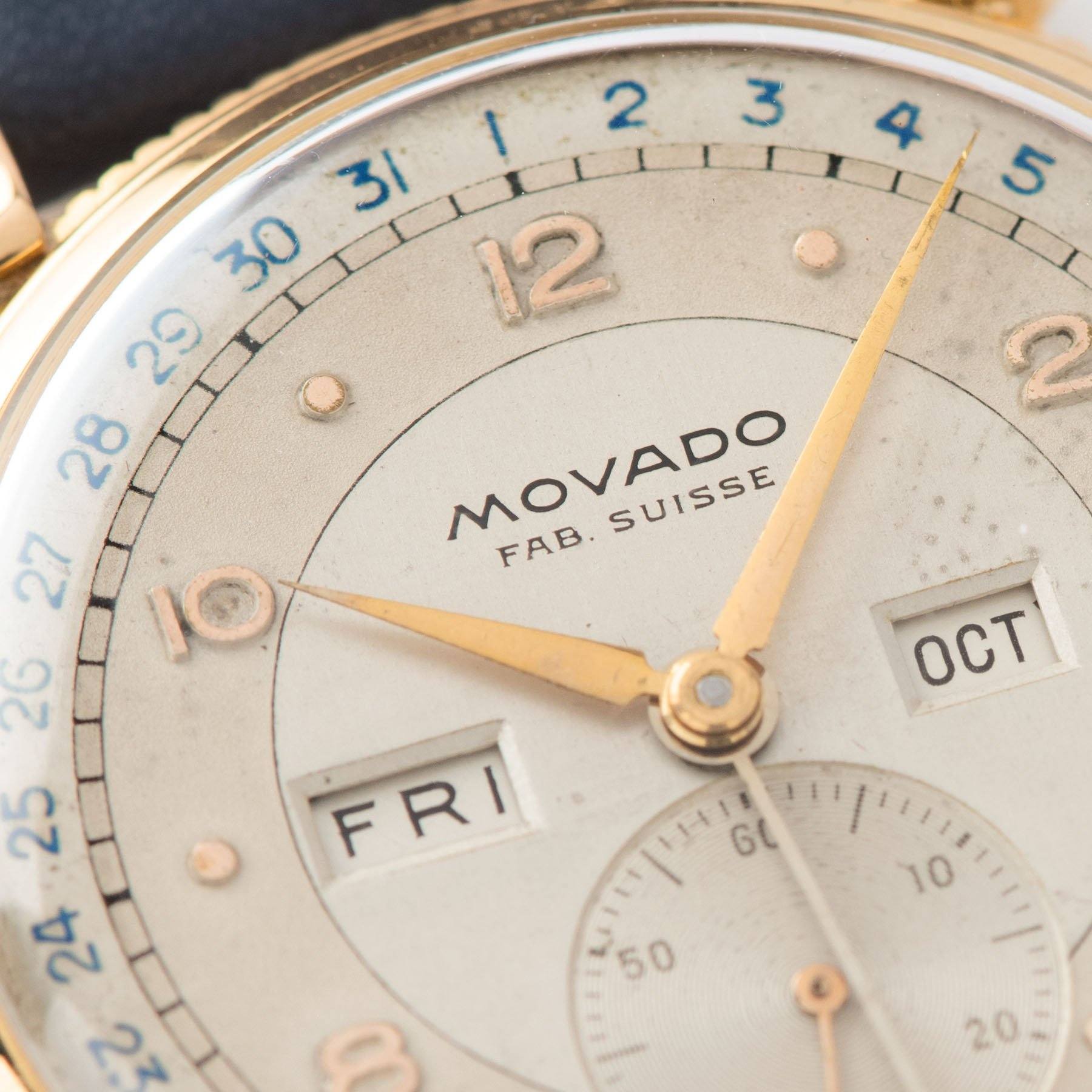 Movado Triple Calendar Pink Gold Dress Watch  with blue date track